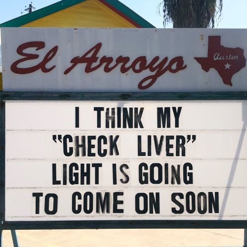 Funny restaurant sign: I think my "check liver" light is going to come on soon.