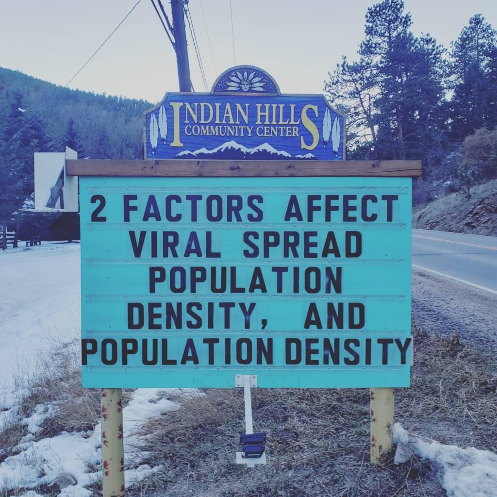 Funny Indian Hills Community Center Road Sign Joke: 2 factors affect viral spread population density and population density.
