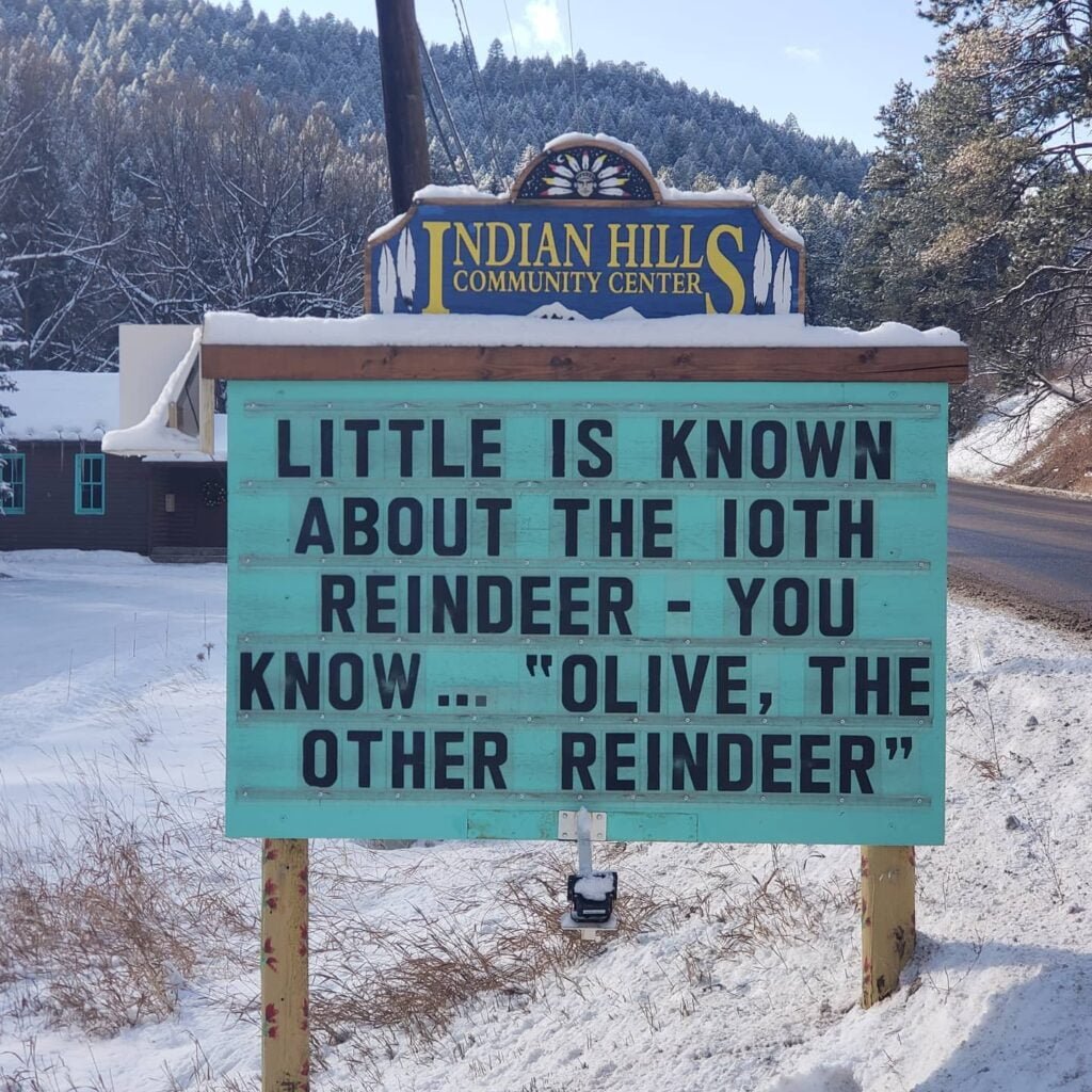Funny Indian Hills Community Center Road Sign Joke: Little is known about the 10th reindeer - You know ... Olive, the other reindeer.