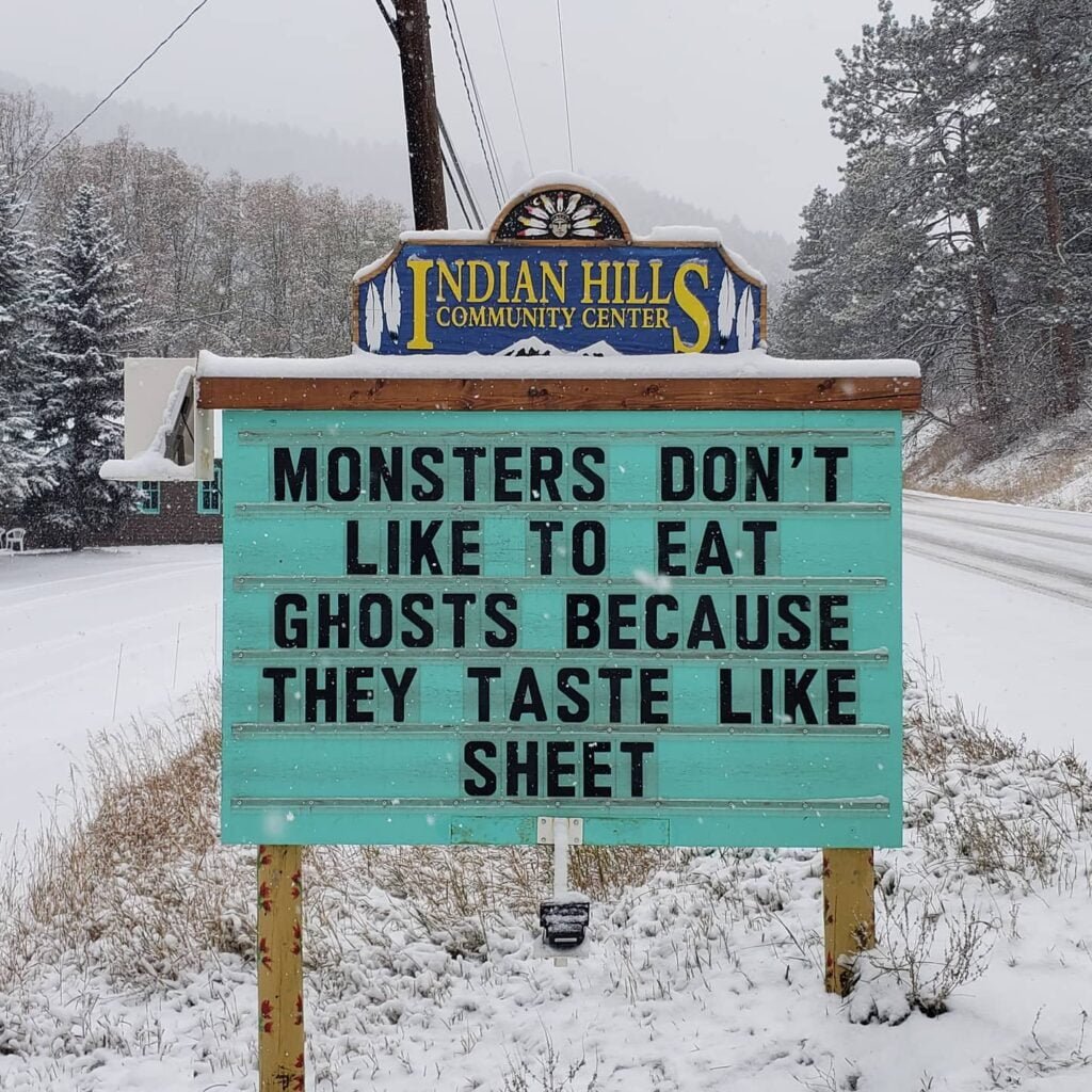 Funny Indian Hills Community Center Road Sign Joke: Monsters don't like to eat ghosts because they taste like sheet.