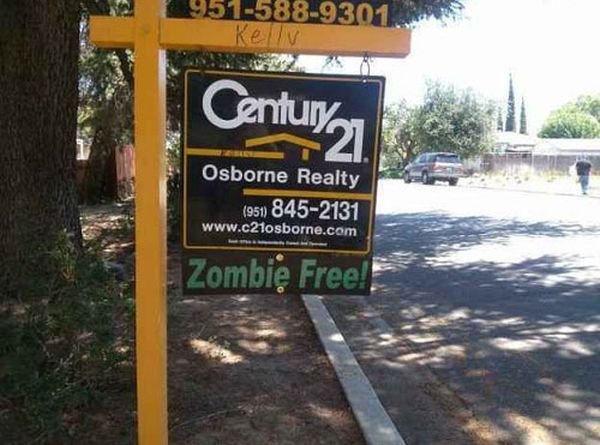 Funny real estate house for sale sign: zombie free