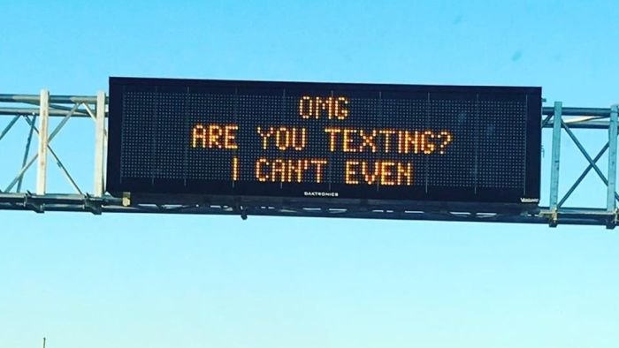 Funny Highway Road Signs OMG are you texting? I can't even
