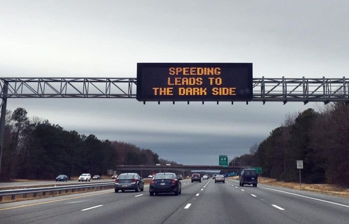 Funny Highway Road Signs speeding leads to the dark side