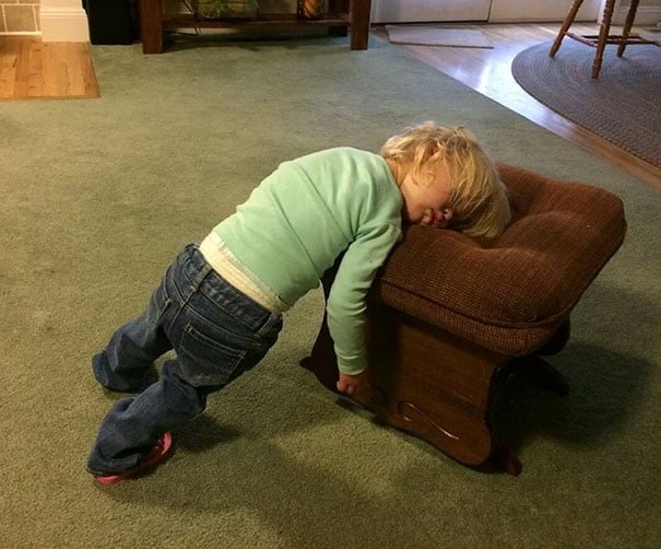 Kids fall asleep in funny places and positions child sleeps while standing