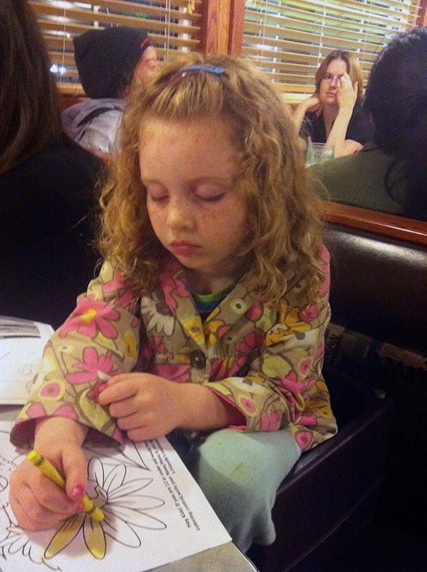 Kids fall asleep in funny places and positions little girl sleeps while drawing