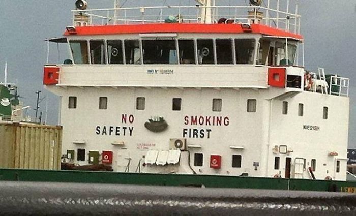 Funny Confusing Sign no safety smoking first