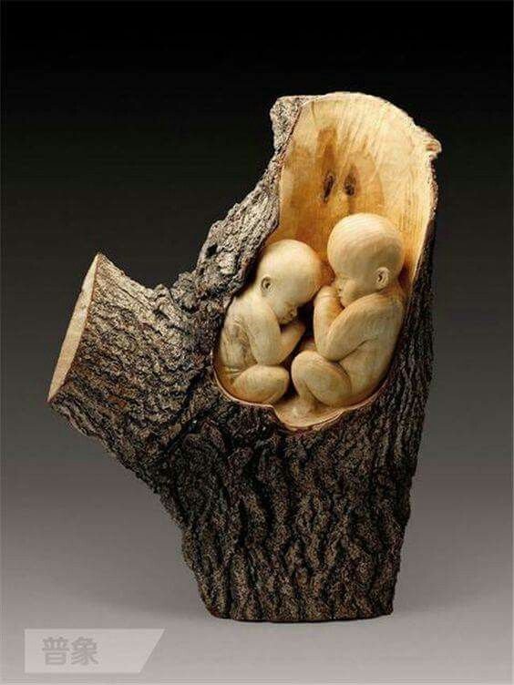 Impressive Wood Carving babies sculpture