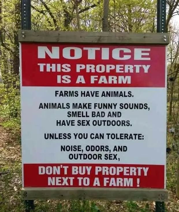 Funny Yard Sign notice this property is a farm