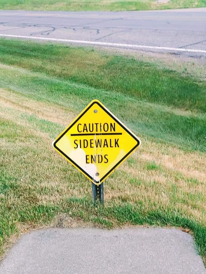 Funny Sign sidewalk ends