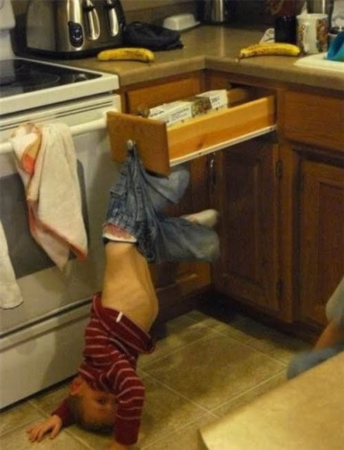 Hilarious kid gets stuck in drawer