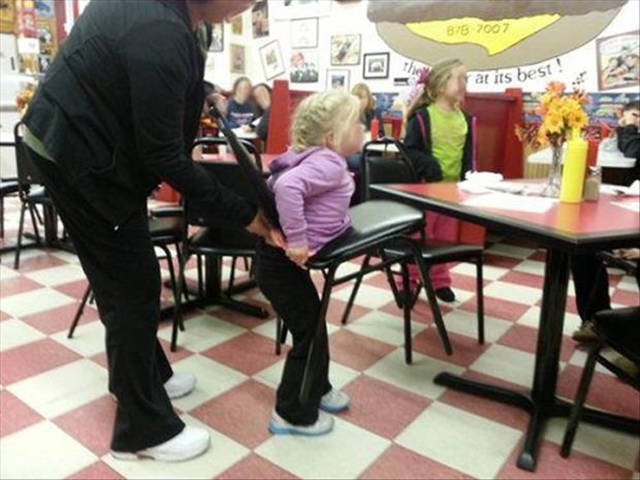 Hilarious kid gets stuck in chair