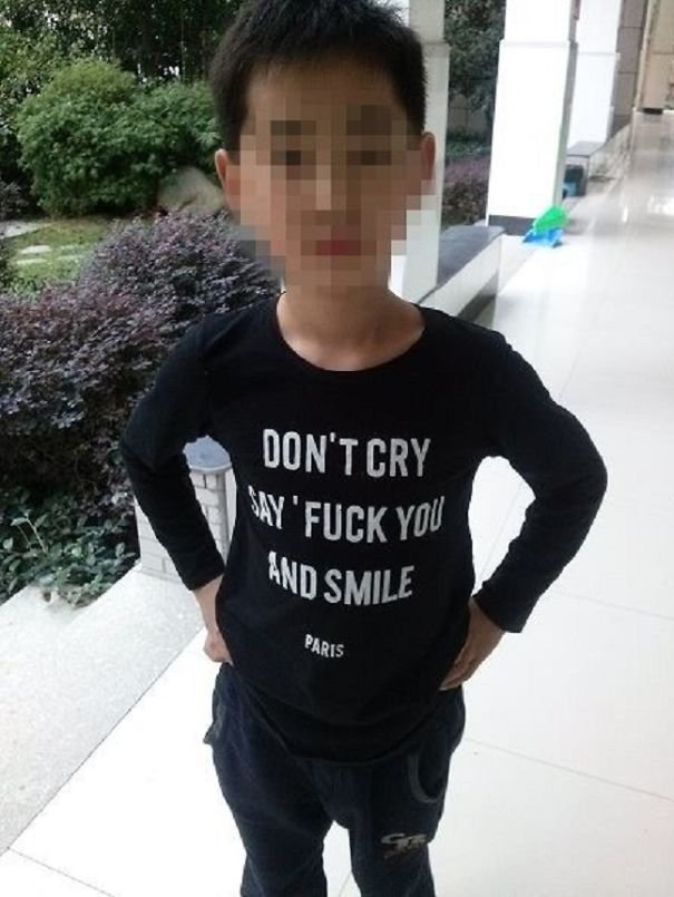 people have no idea they are wearing inappropriate clothes little boy wears t-shirt reading don't cry say fuck you and smile