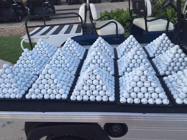 oddly satisfying photos perfect golf balls pyramids