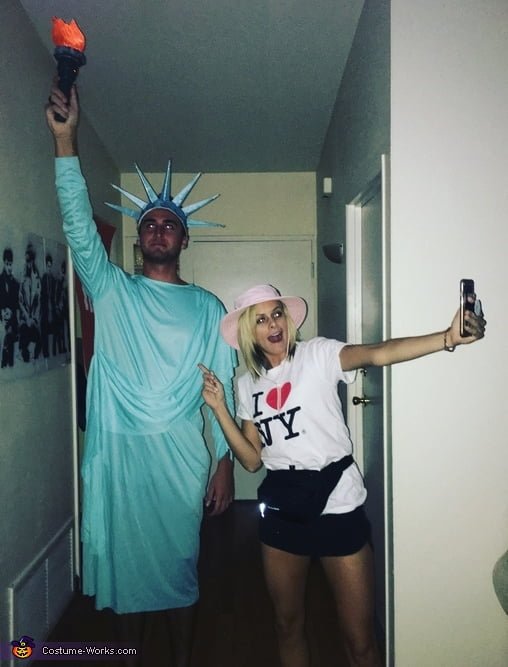 creative couples Halloween costume idea statue of liberty and tourist
